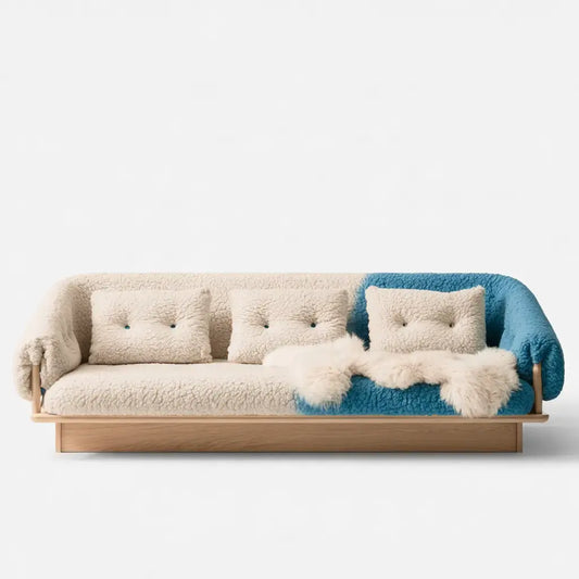 Sofá con respaldo asimétrico y cojines decorativos - beige/azul