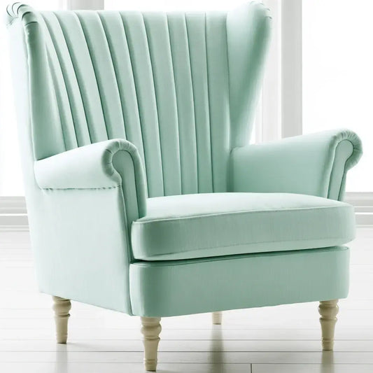 Sillón orejero con respaldo estriado - verde